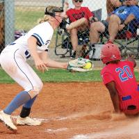 Morgan Brothers looks up for the umpire’s call after tagging out a base runner