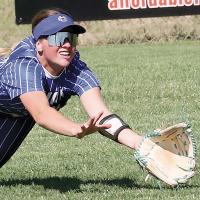 Morgan Brothers dives forward with her glove open trying to snag a ball