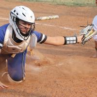 Makinzie DeLong just misses a sweep tag on a base runner