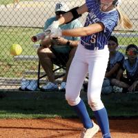 Mia Gambel connects with a pitch