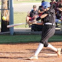 Makinzie DeLong connects with a pitch