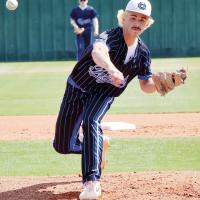 Blake Bailey watches a pitch fly toward the plate
