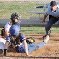 Shelby Davis closes her eyes as she reaches out 