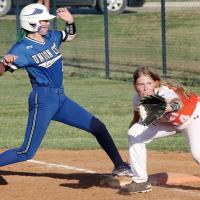 Megan Goad stretches to tag the bag as Payton Barnes looks a pickoff throw