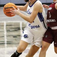 Bree Goad drives around a defender