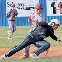 Dawson Davidson tries to duck under a tag