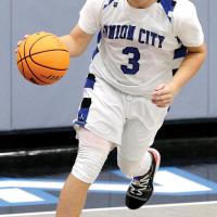 UCHS boys baketball_ Armstrong dribbles upcourt
