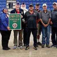 Union City dignitaries were awarded signs 