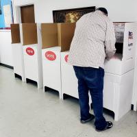 An El Reno resident votes during an election in March