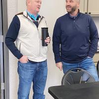 David Black (left) talks with Tyler Johnson