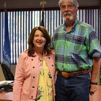 Dr. David Von Tungeln is congratulated by Janie Thompson