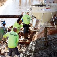Workers pour concrete