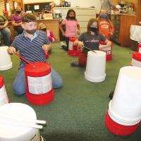 Carrying their tunes in a bucket_story art