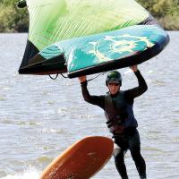 Charles Martin falls off his surfboard while gliding 