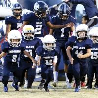 EHS football players with little league