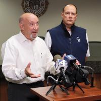 Ken Brown (left) gives an update on the city’s water issues while Superintendent Matt Goucher, spoke on the district’s closure