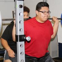 Alex Perdamo readies a bar of weights
