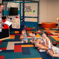Mayor Matt White reads to children at Carnegie Library