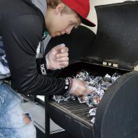 Jordan Clements sorts hamburgers being kept warm