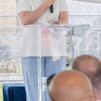 Heather Rice-Minus speaks to the crowd gathered at the ribbon-cutting event
