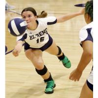 Bri Barksdale (16) dives to try and dig up a hit by Tecumseh in game two of the season opener with the Savages.