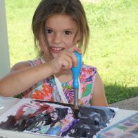 Sadie Duncan paints with watercolors