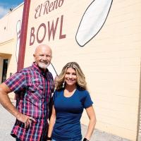 David Dunn and Melissa Stringer in front of the El Reno Bowl sign