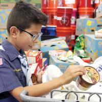 Cub Scout Arias with donations