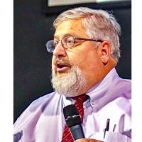 Associate District Judge Bob Hughe