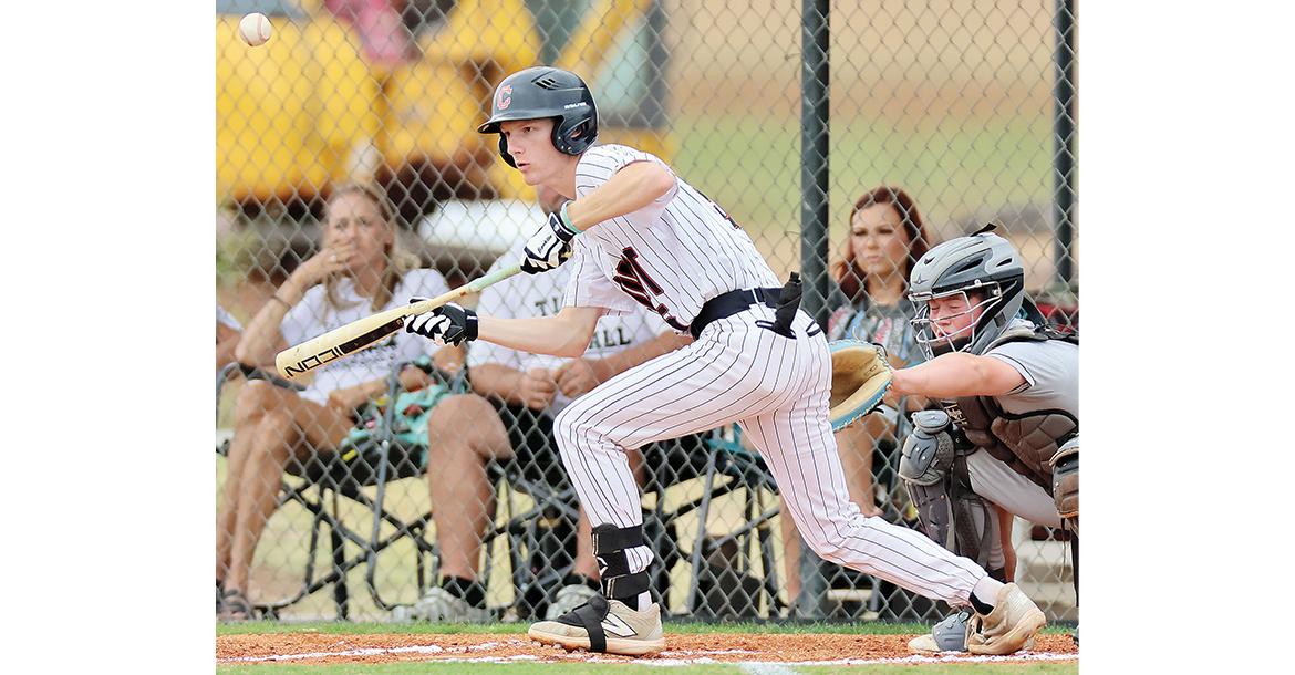Konnor Thiessen drops down a bunt_slideshow