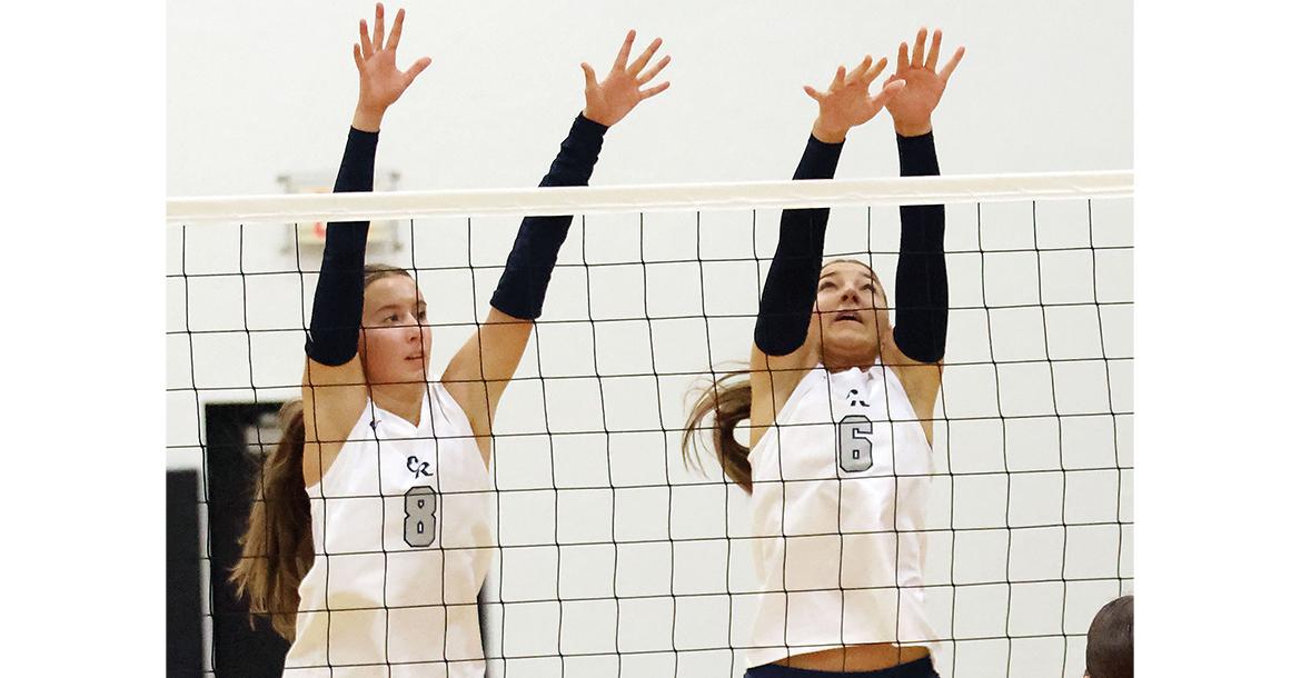 Brantlie Charmasson (8) and Ruby Curtis (6) combine for double block attempts_slideshow