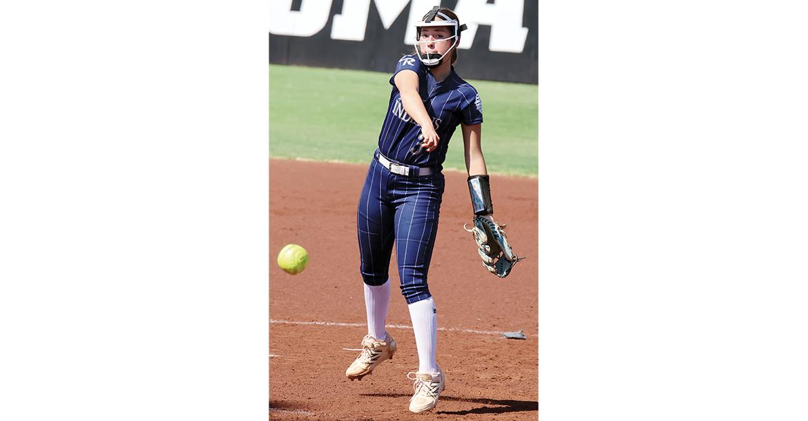 Zoey Pawnee follows through on a pitch_slideshow