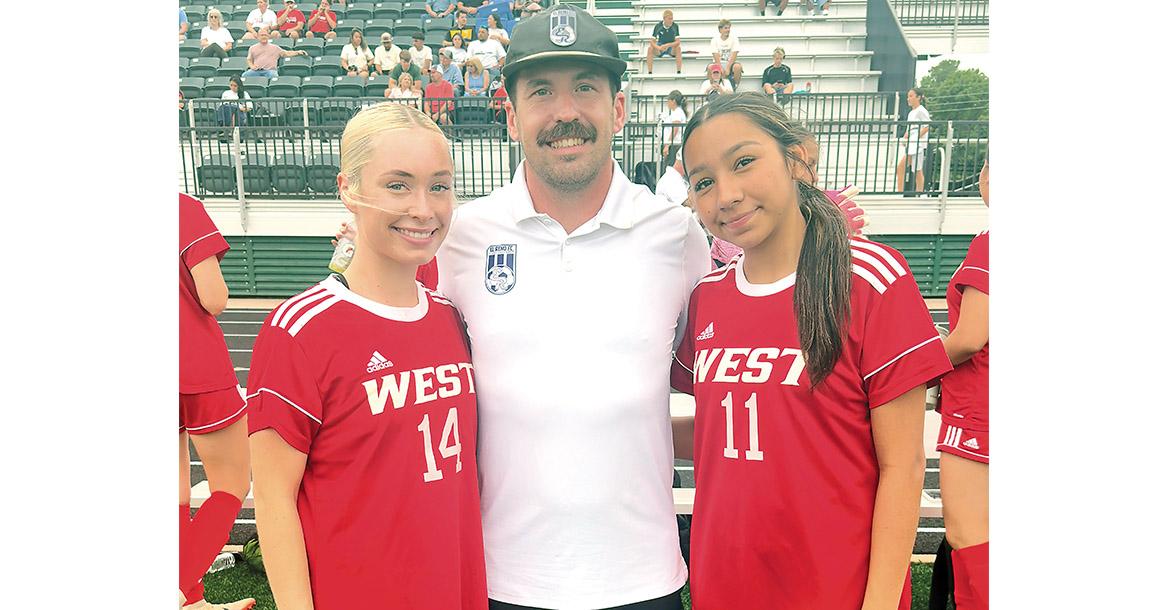 Anthony Klipp with Lily Hayes (14) and Grisell Guzman (11)_slideshow