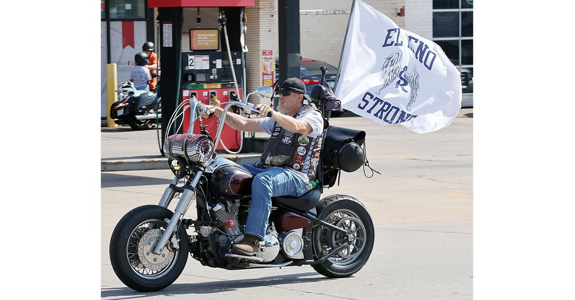 Matthew Wickware rides his motorcycle down Sunset toward the starting point_slideshow