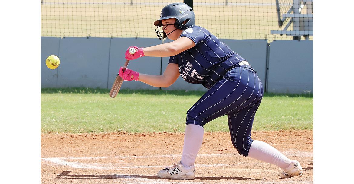 Daisy Hall (7) drops down a bunt in the Indians win over Bishop McGuinness_slideshow