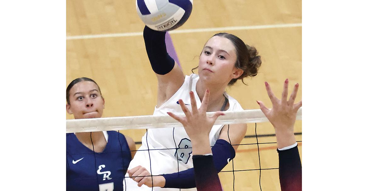 Brantlie Charmasson tries to hit through a block at the net by Tuttle_slideshow