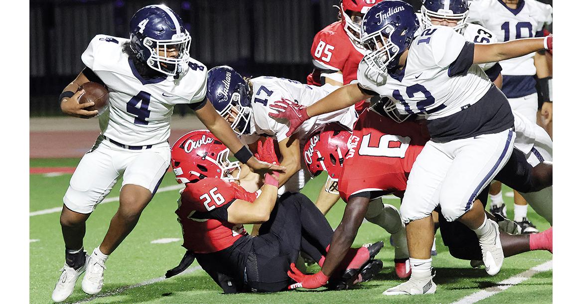 DeCarlos Banks (4) breaks to the outside after getting a path protected by lineman Jaylen Ferguson (12)_slideshow