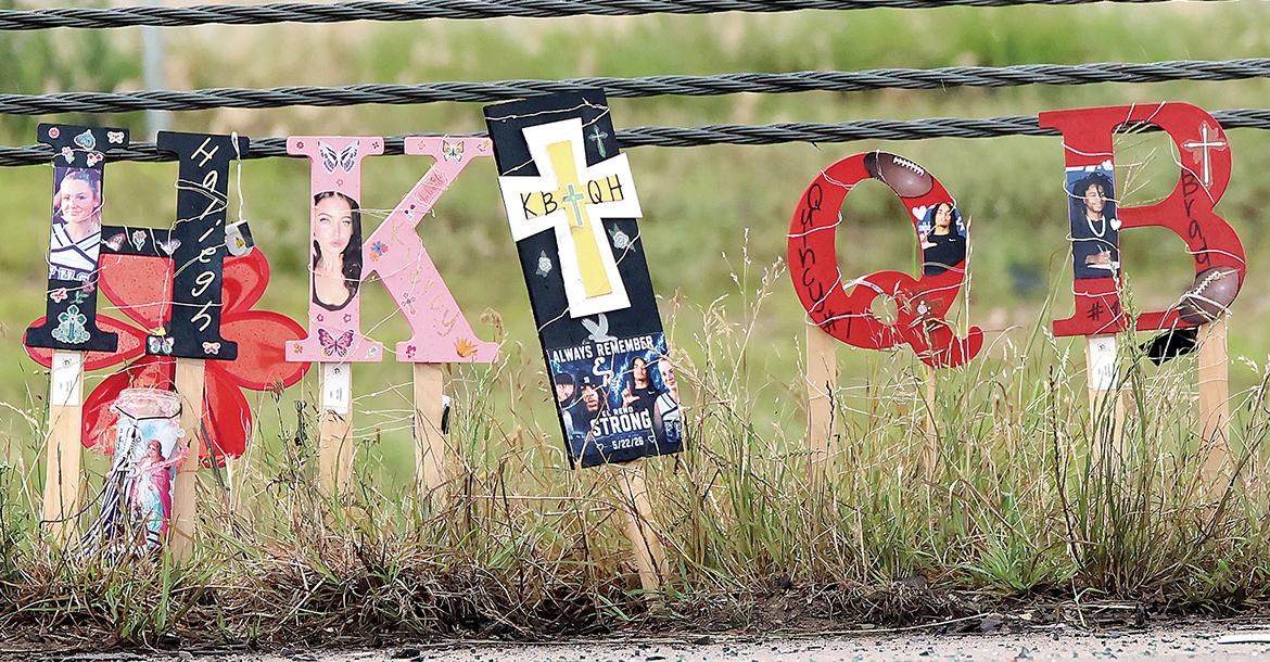 One of several roadside memorials at the collision site_slideshow