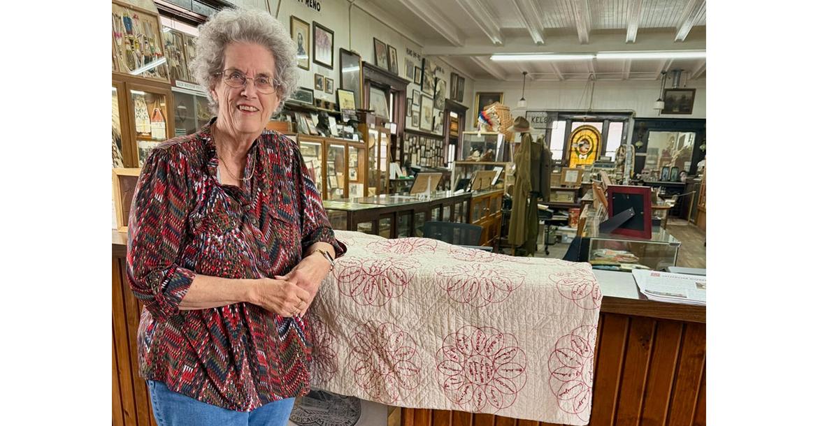 Jane Noland with donated quilt_slideshow