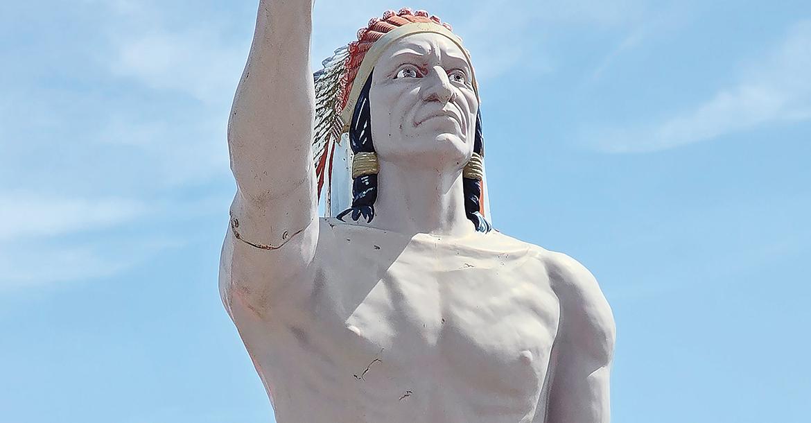 This June photo shows the statue in front of a business_slideshow