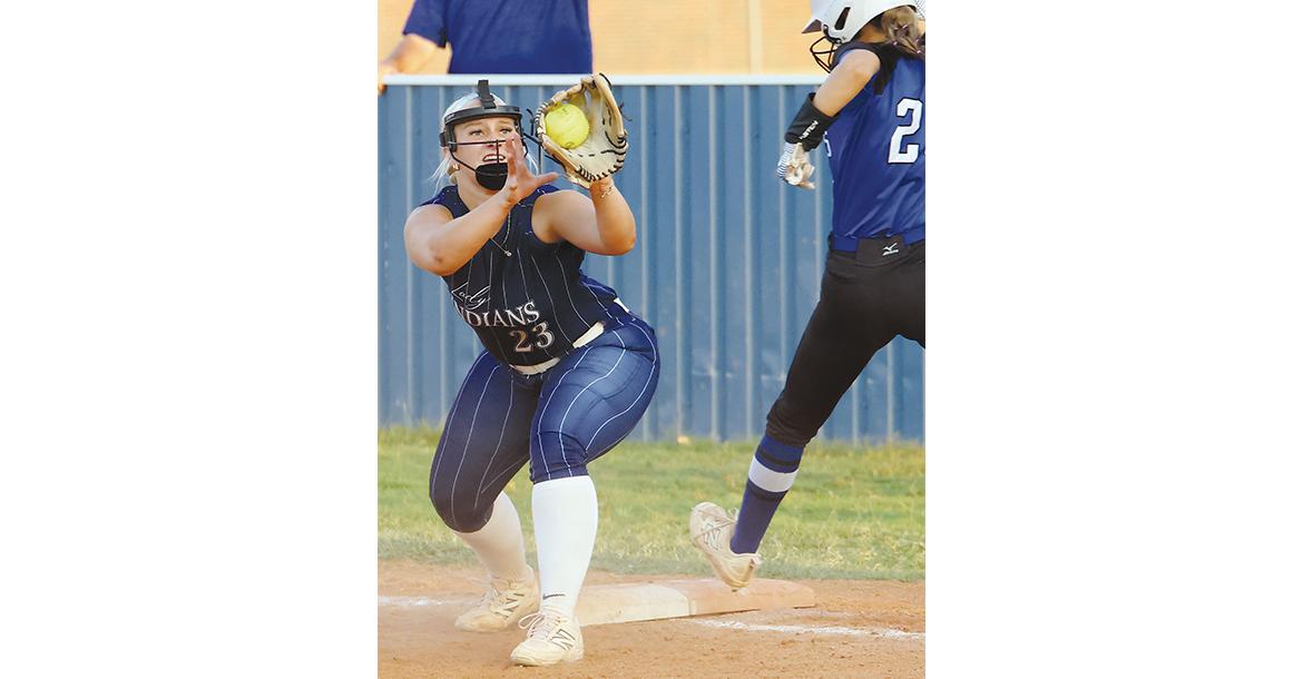 Lexi Porter gloves a throw to the bag as a Guthrie runner approaches_slideshow