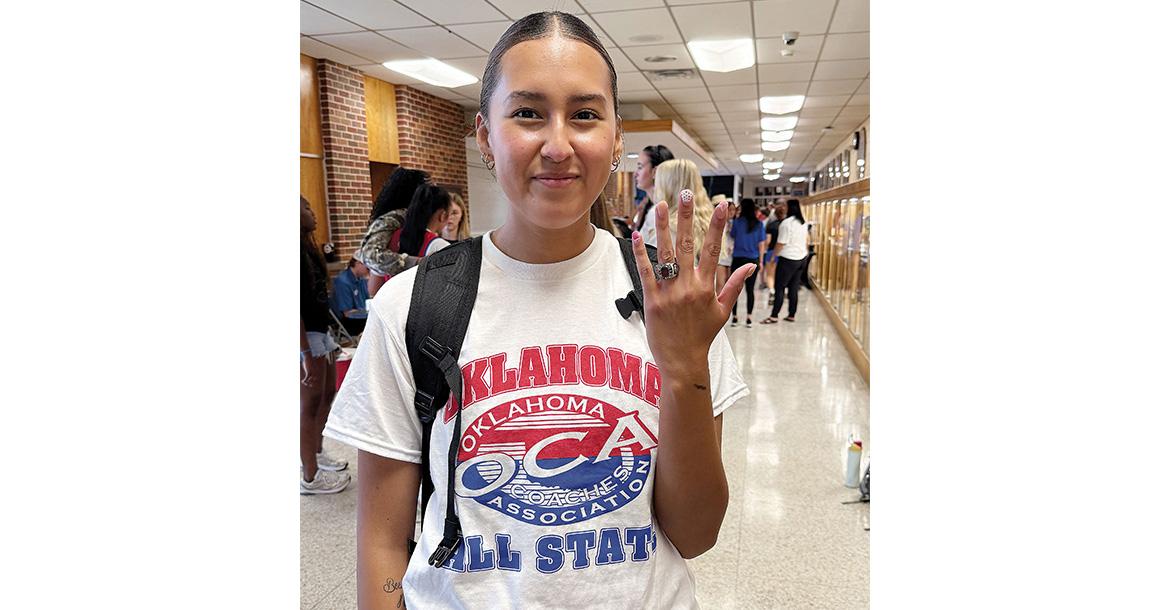 Eryn Roman Nose shows off the All-State ring given to players_slideshow