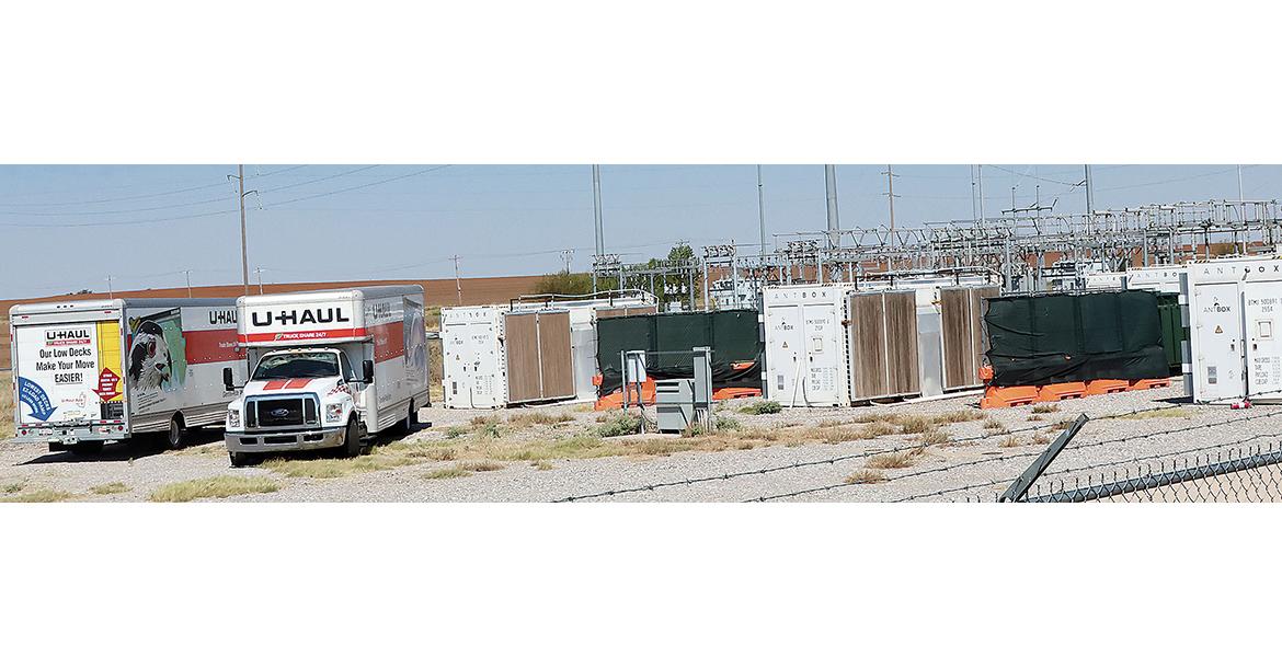 Two box trucks can been seen on the site of a Bitcoin mining business on Jensen Road_slideshow