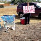 Sarah Pedro stands on the side of South Country Club Road