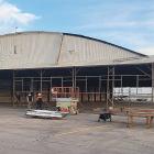 Crews are taking down an old hangar at El Reno Regional Airport