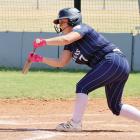 Daisy Hall (7) drops down a bunt in the Indians win over Bishop McGuinness