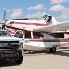 The fuel tanker at El Reno Regional Airport pulls up next to one of the firefighting planes