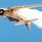 Jeff Shetterly flies his T-6 Texan into an inverted loop