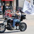 Matthew Wickware rides his motorcycle down Sunset toward the starting point