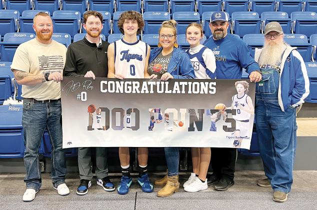 J.D. Riley became the third area player to break the 1,000-point career scoring mark during the first half of the 2023-24 basketball season